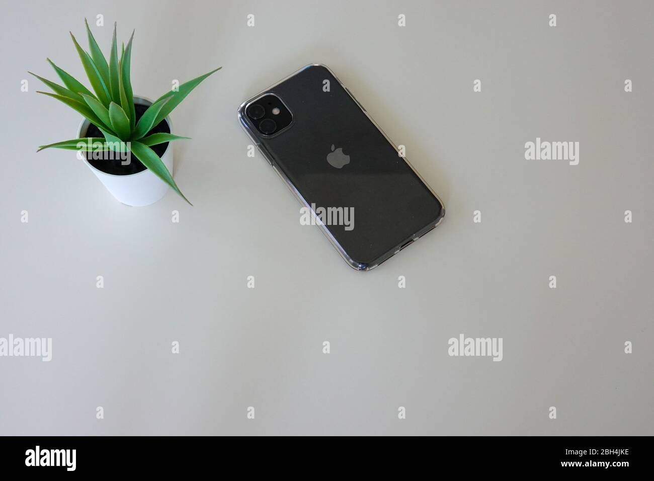 Orlando,FL/USA-4/1/20:  An Apple iPhone 11 smartphone laying on a white background. Stock Photo