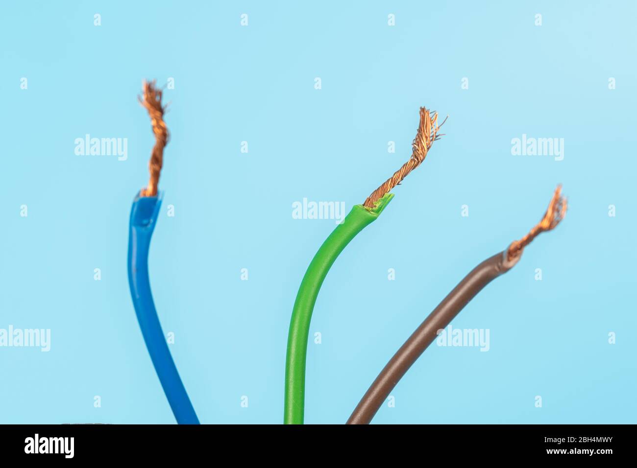 Electric wire isolate on blue background Stock Photo