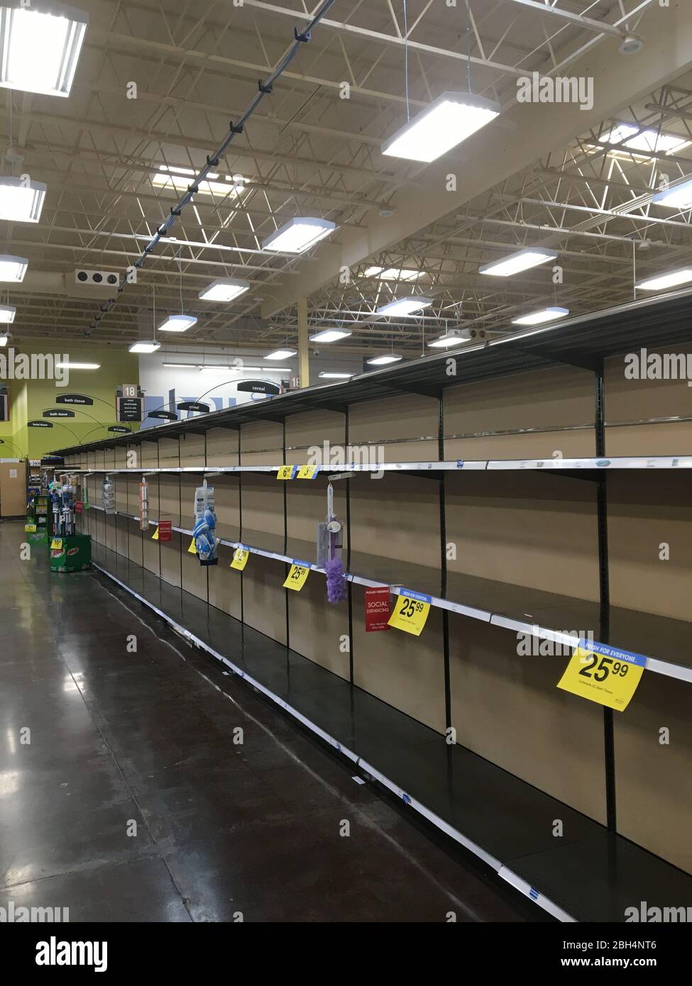 Empty shelves at a Fred Meyer store in Portland Oregon after panic buying of cleaning and tissue products during the Covid-19 pandemic in April 2020. Stock Photo