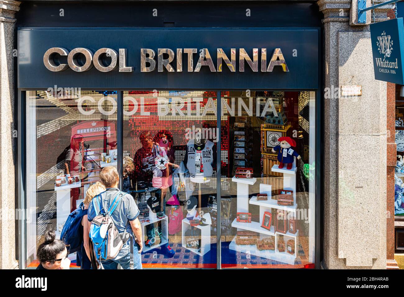 London, UK - June 22, 2018: Cool Britannia gift shop store sign on Buckingham Palace road street in downtown city during summer day above view Stock Photo