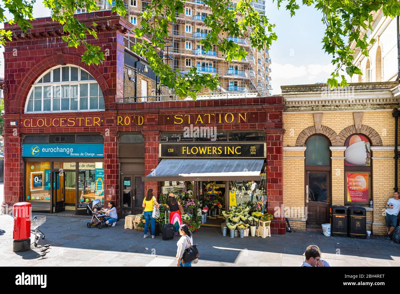 London, UK - June 22, 2018: Neighborhood of south Kensington with Gloucester road station sign during summer day above view and flower shop Stock Photo