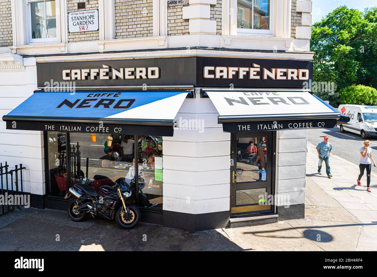 London, UK - June 22, 2018: Neighborhood district of south Kensington with Caffe Nero express restaurant cafe shop sign during summer day above view Stock Photo