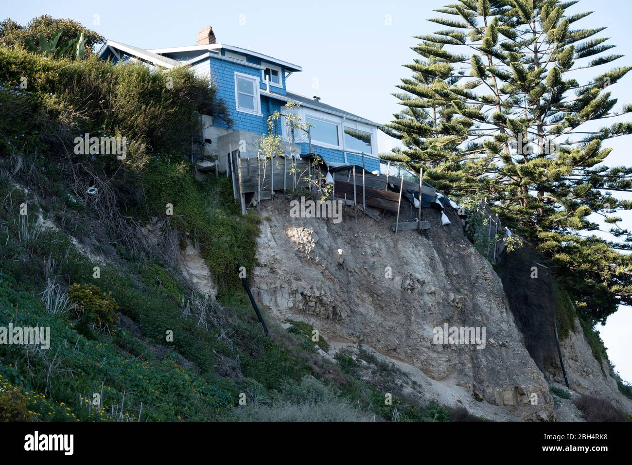 San Pedro, CA/USA April 3, 2020 A house sliding into the ocean at