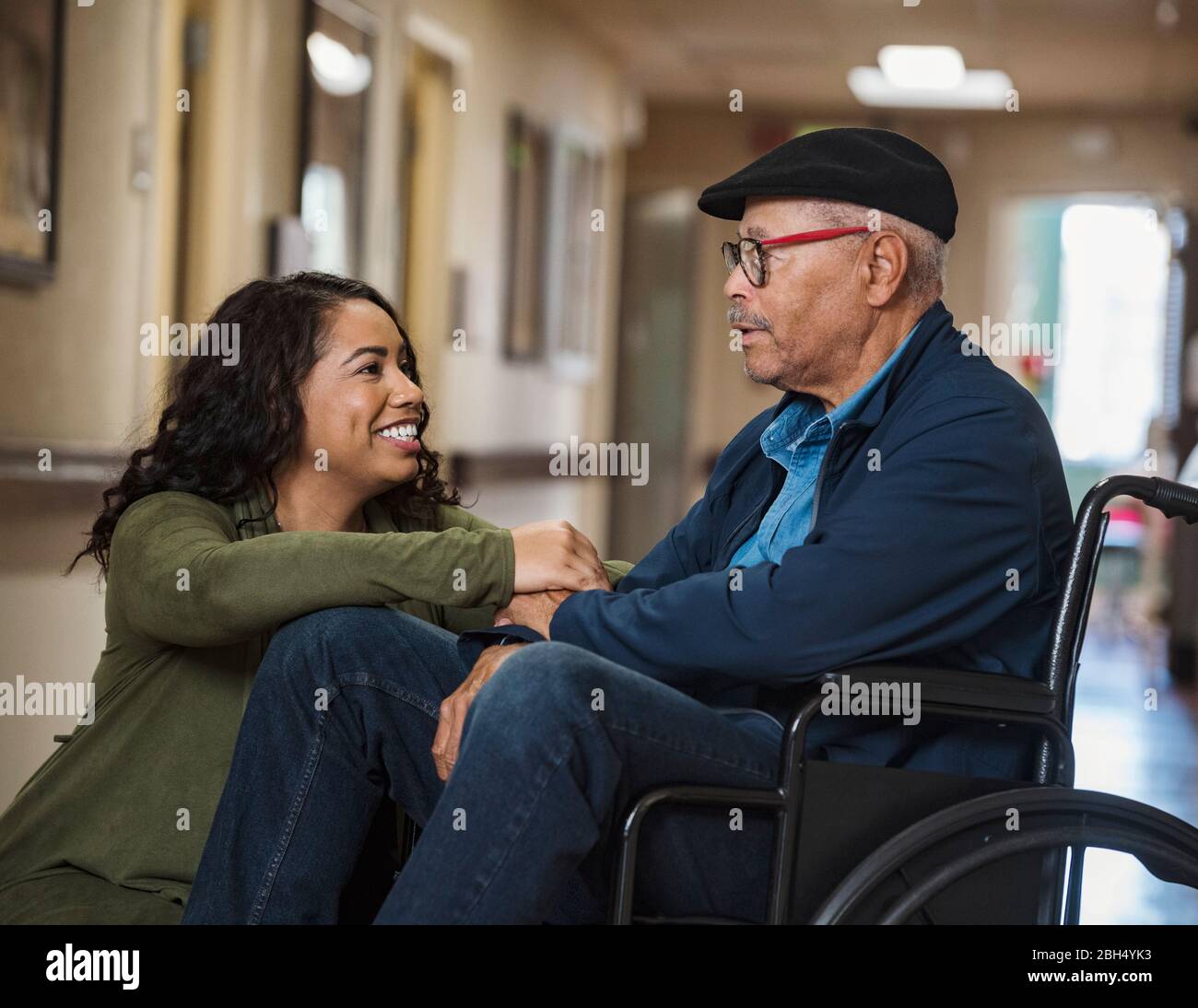 Man woman in wheelchair hi-res stock photography and images - Alamy