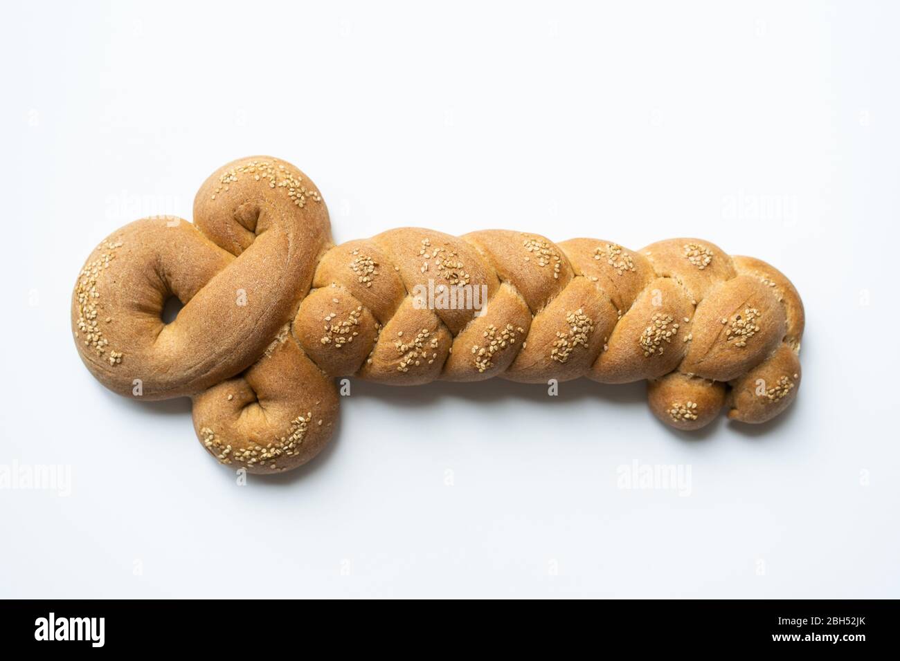 Shlissle challah from top view bread in shape of a key isolated