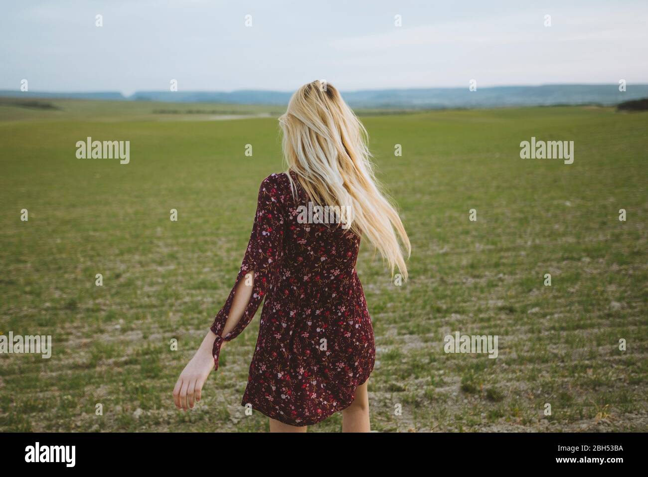 Woman running dress rear view hi-res stock photography and images - Alamy