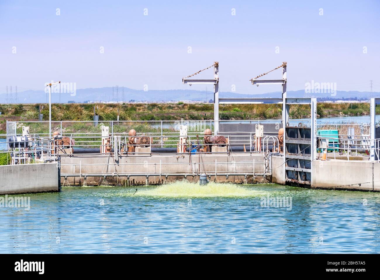 Water dam and filtration system for the management of the South San Francisco Bay Area wetlands