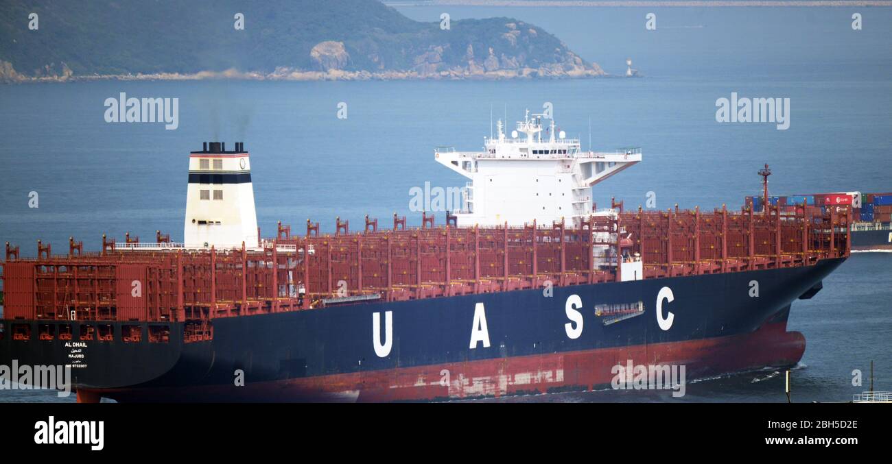 A large container ship near the Hong Kong Harbour. Stock Photo