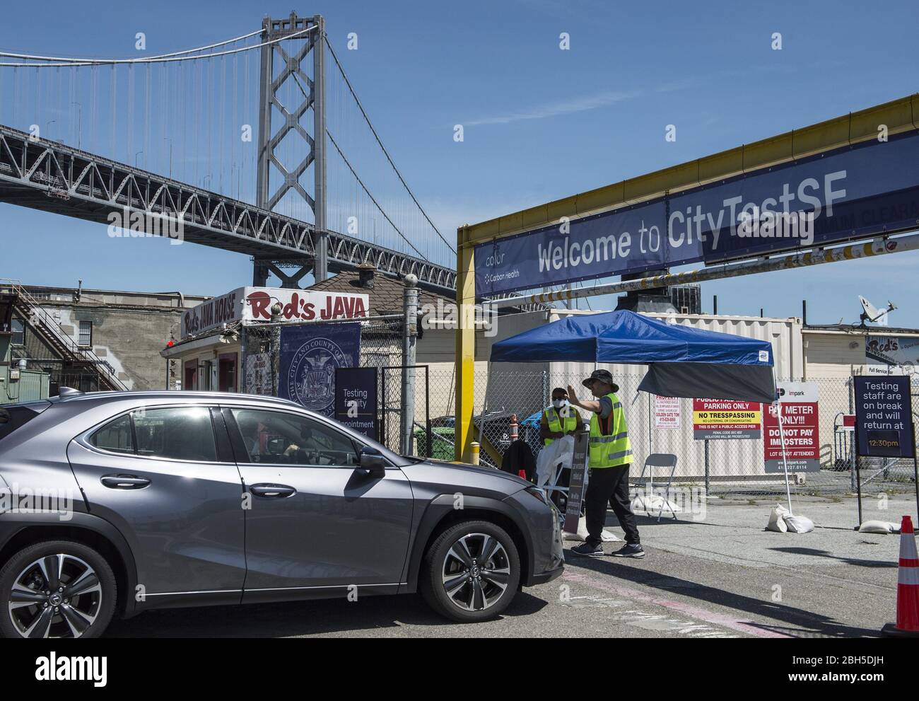 San Francisco, United States. 24th Apr, 2020. Workers advise a driver appointments are needed for coronabvirus testing at a site on the Embarcadero tn San Francisco on Thursday, April 23, 2020. San Francisco has set up drive through coronavirus testing by appointment. Photo by Terry Schmitt/UPI Credit: UPI/Alamy Live News Stock Photo