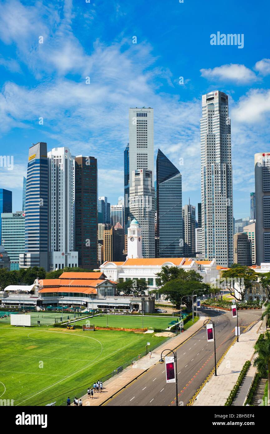 View from the National Gallery of Singapore over the Padang, Victoria Theatre and Concert Hall, and the skyline of the business district; Singapore Stock Photo