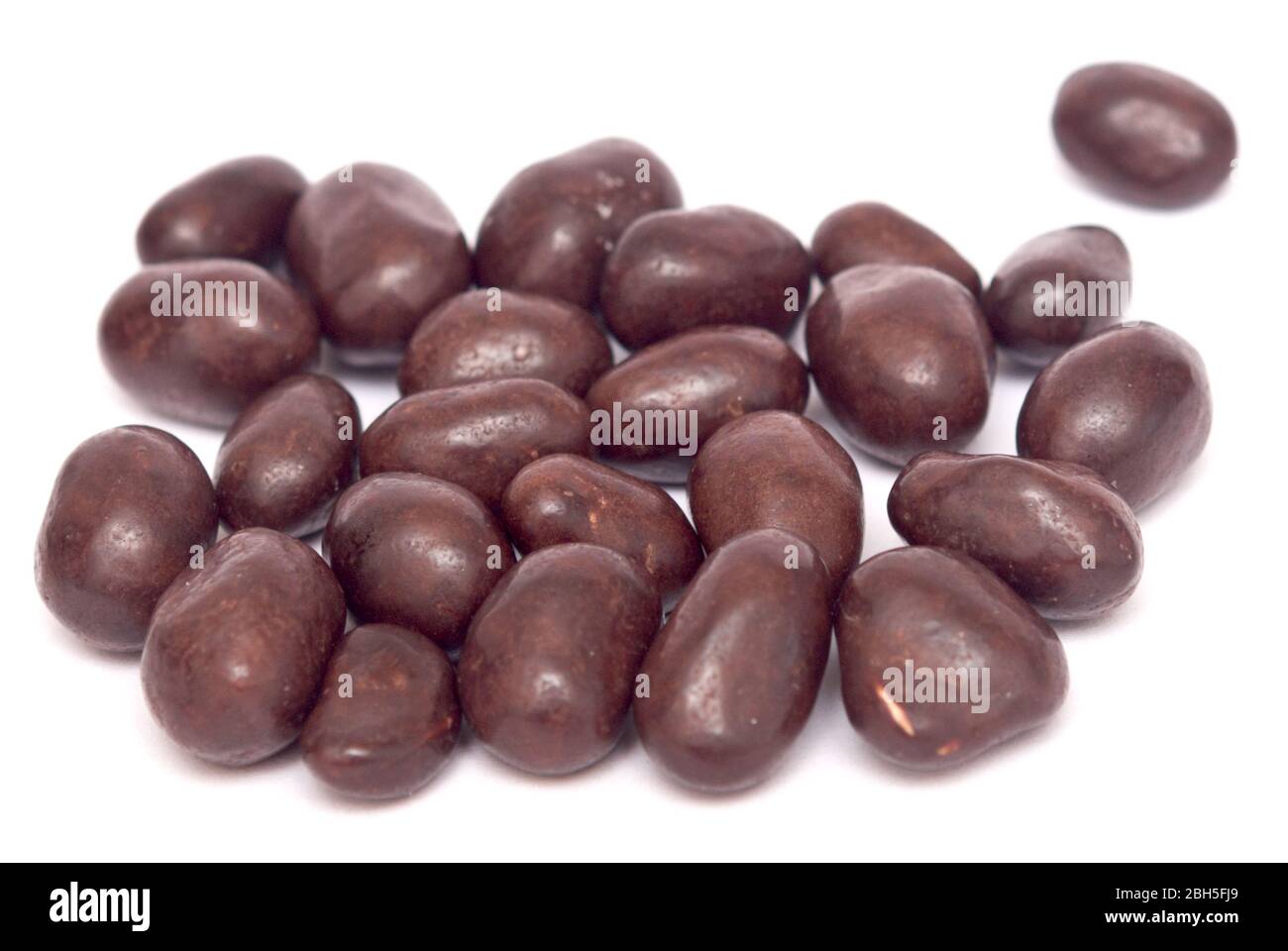 Peanuts in chocolate isolated on white background Stock Photo