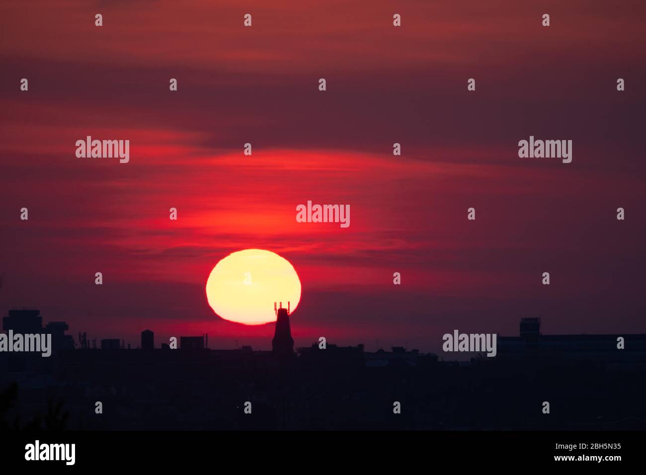 London, UK. 24th Apr, 2020. Sunrise over London in lockdown due to the Coronavirus outbreak taken from Primrose Hill. Credit: David Parry/Alamy Live News Stock Photo
