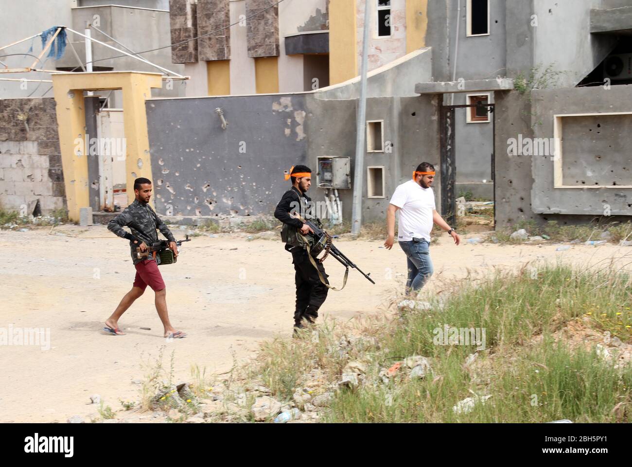 Tripoli, Libya. 23rd Apr, 2020. Fighters of the UN-backed Government of National Accord (GNA) are seen in Tripoli, Libya, April 23, 2020. The east-based army has been leading a military campaign since early this month in and around the Libyan capital of Tripoli to take over the city and topple the UN-backed government. Despite international call for cease fire in Libya, the deadly armed conflict has continued with collateral civilian casualties. Credit: Hamza Turkia/Xinhua/Alamy Live News Stock Photo