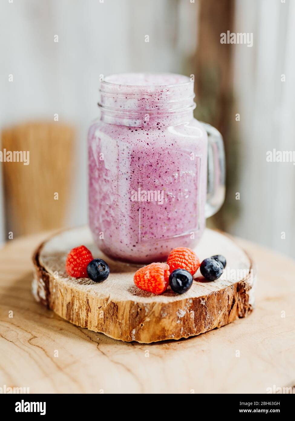 Healthy vitamin shake with dragon fruit, berries, chia seeds and almond ...