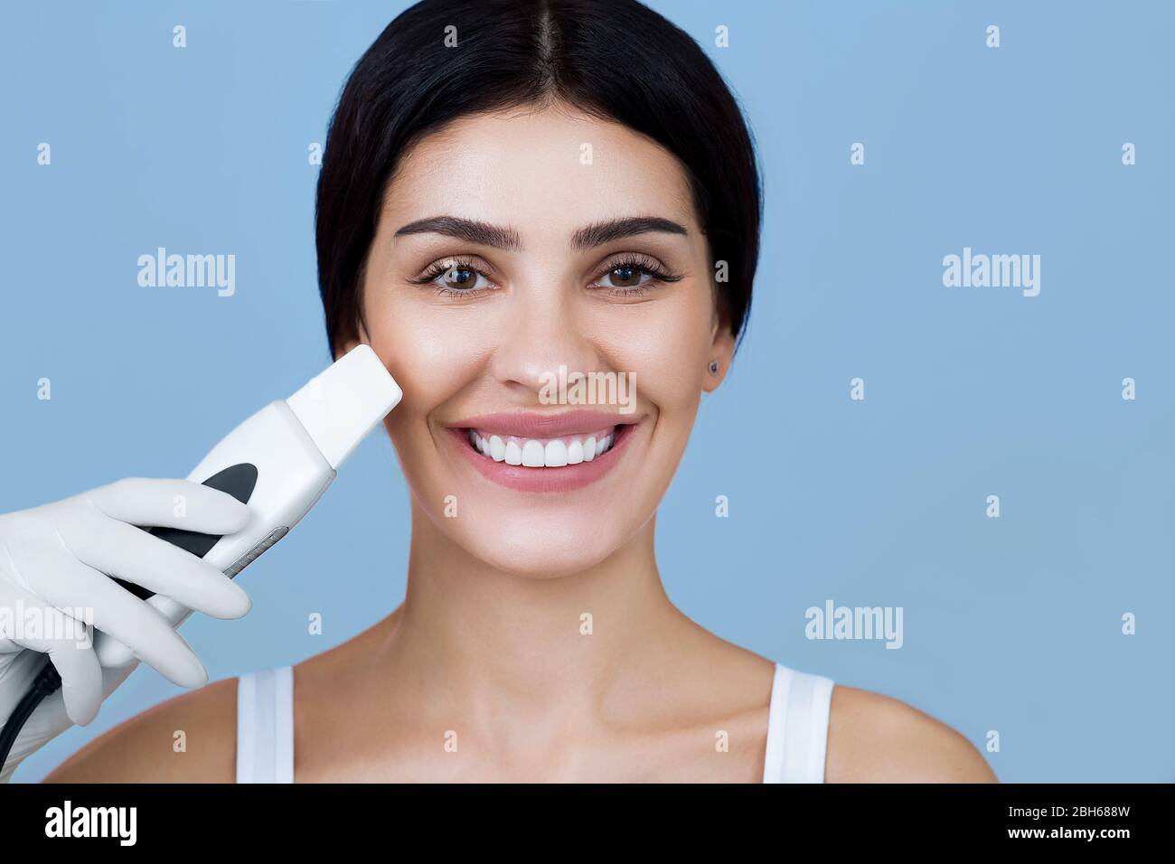 Skin treatment. Beautiful woman getting procedure Ultrasound