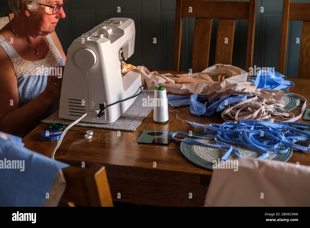 Making scrub bags for NHS Health workers during pandemic at home Stock Photo