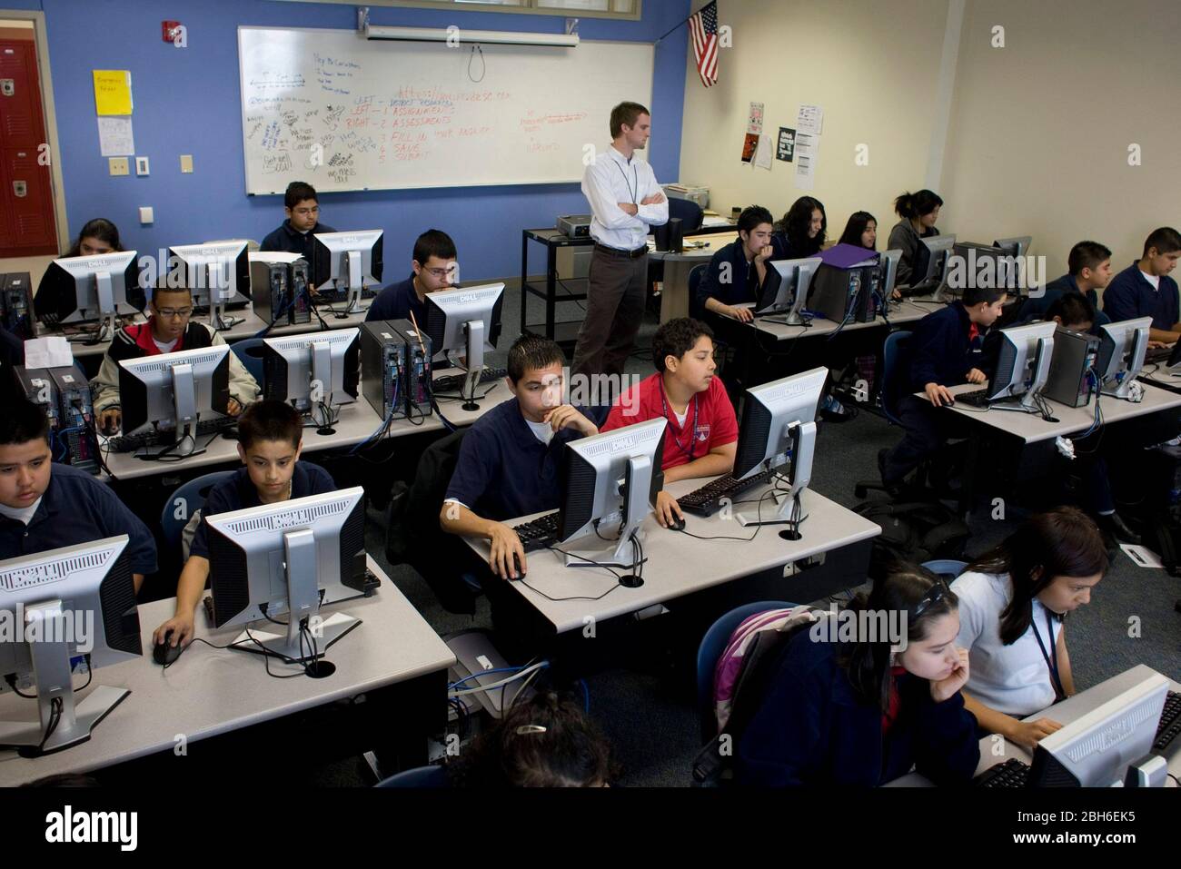 Dallas, Texas, January 23, 2009: Male teacher supervises seventh and ...