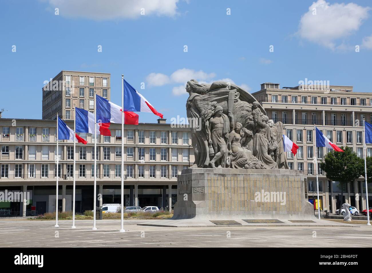 Monuments aux Morts is a monument to honor all civilians who died in the wars. It is surrounded by french flags, Le Havre, Normandy, France. Stock Photo