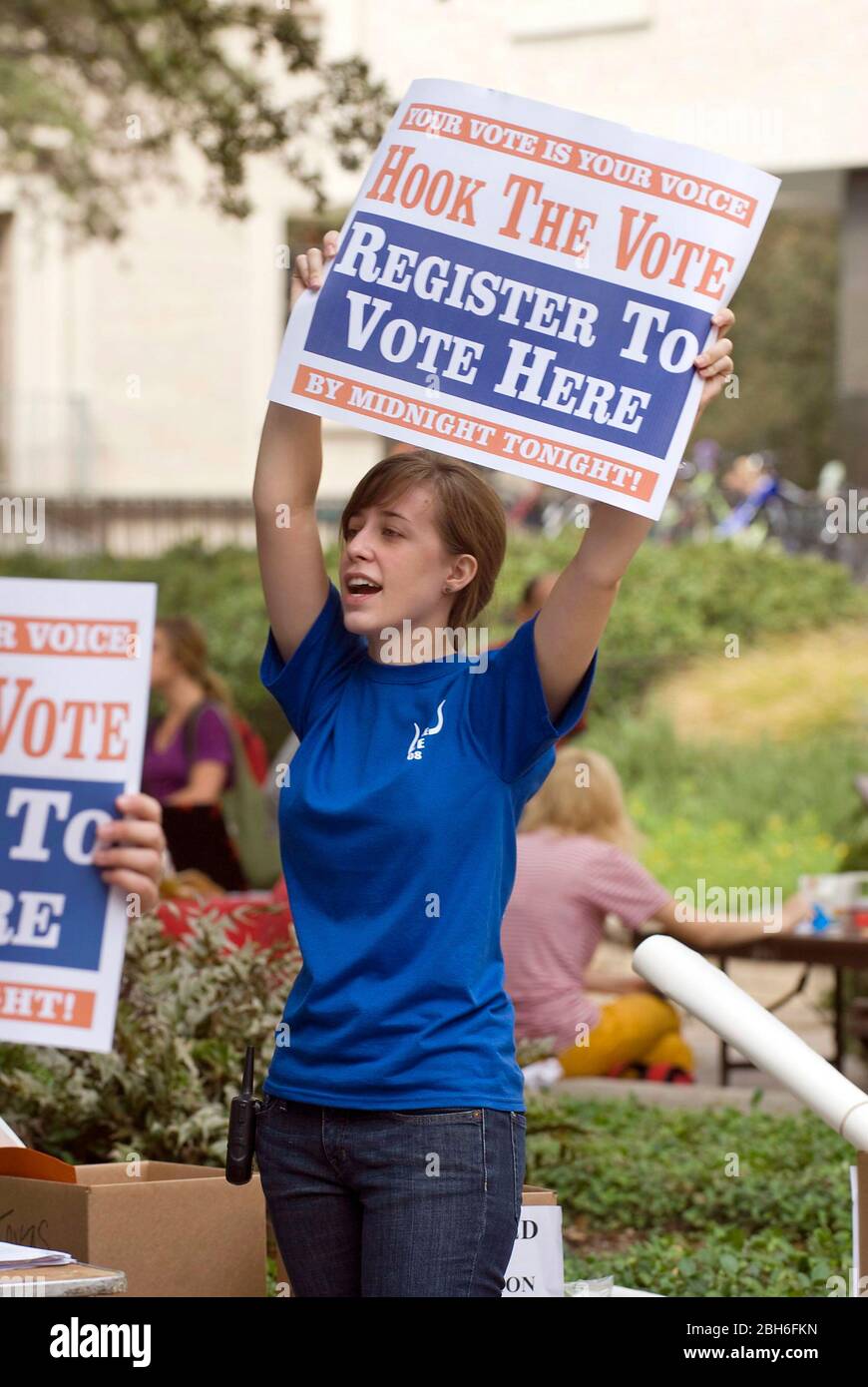 Austin, Texas USA, October 6  2008: Students on the University of Texas campus wave signs to attract prospective voters to register before the deadline for registration to vote in  the upcoming presidential election.  ©Marjorie Kamys Cotera/Daemmrich Photography Stock Photo