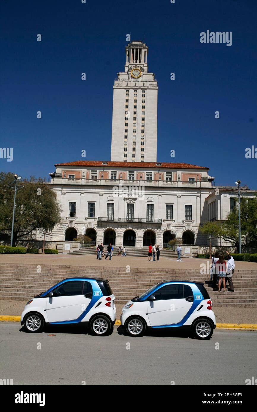 Austin, Texas USA, March 18, 2009. SmartforTwo car, made by German car company Daimler, announces a car-sharing pilot program modeled after  successful trials in Ulm, Germany. Austin will be the U.S. test site for 'Cars2Go' where drivers can rent the GPS-enabled cars by the minute with car locations being tracked on the internet. Here tp cars are parked in the space that one full-sized vehicle would take up. ©Bob Daemmrich Stock Photo