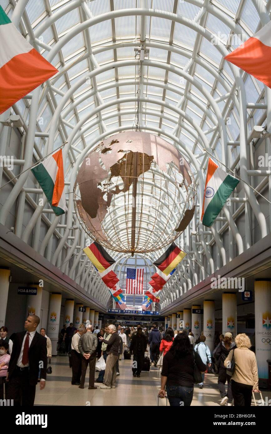 Chicago, Illinois USA, April 28, 2009: Flags of many countries flying in the Terminal H concourse at Chicago's O'Hare Field. The city is also flying banners in preparation for its bid on the 2016 Olympics.  ©Bob Daemmrich Stock Photo