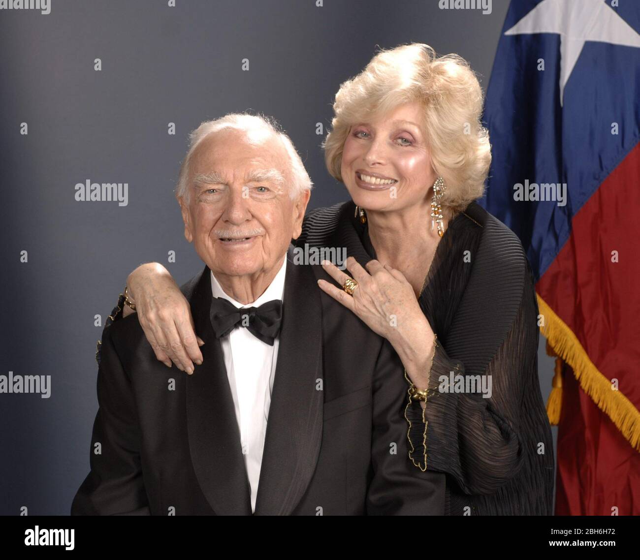 Austin, Texas USA, March 1, 2006: Former CBS newsman Walter Cronkite (left) and new fiancee Joanna Simon pose while greeting guests at a Texas Independence Day fete at the Texas State History Museum.  Cronkite, 89, was honored for a lifetime of achievement in Texas.    ©Bob Daemmrich Stock Photo