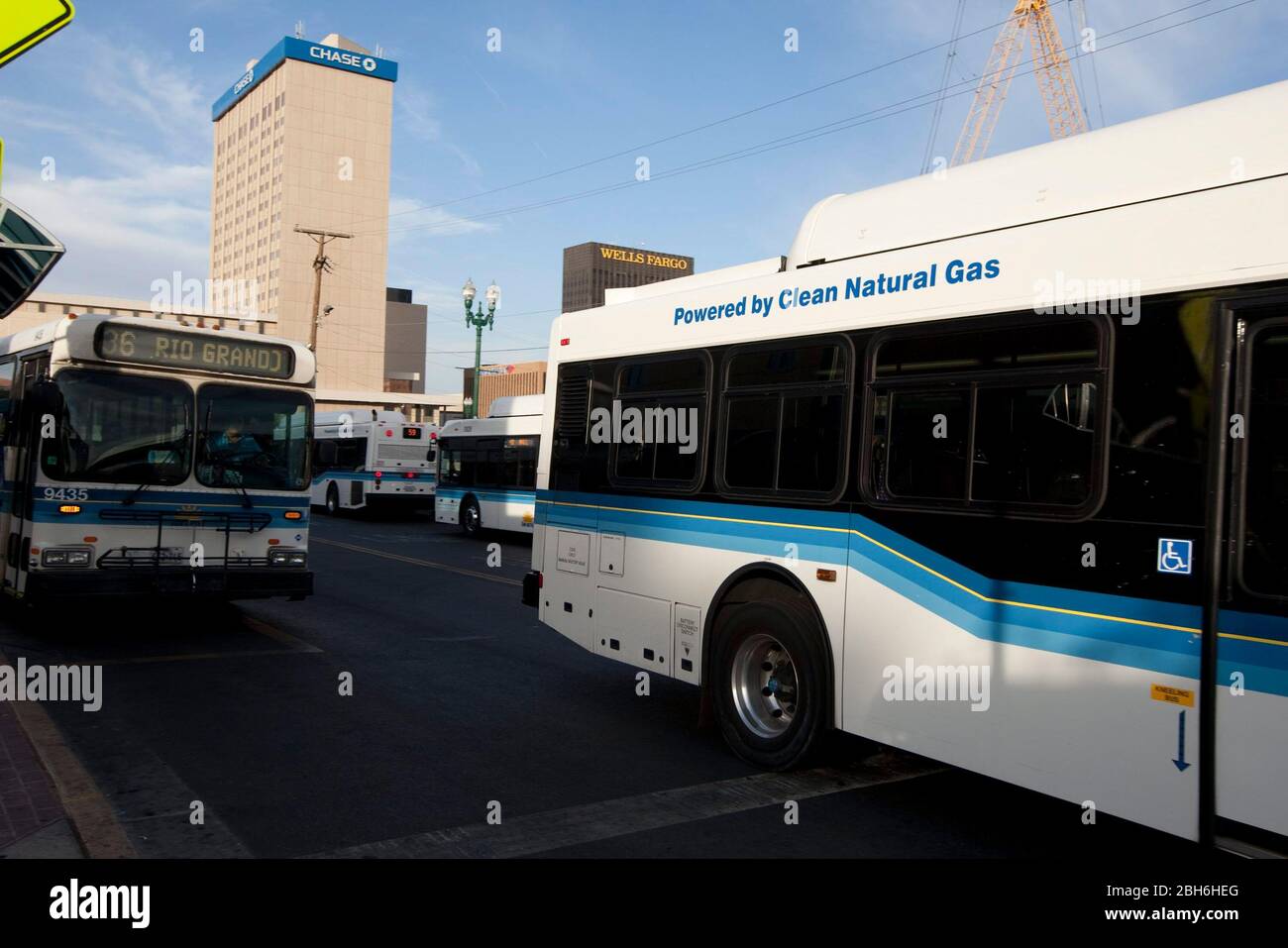 El Paso, Texas May 14, 2009: Scenes from the arts district downtown El Paso, TX showing city buses powered by natural gas at the downtown bus terminal.  ©Bob Daemmrich Stock Photo