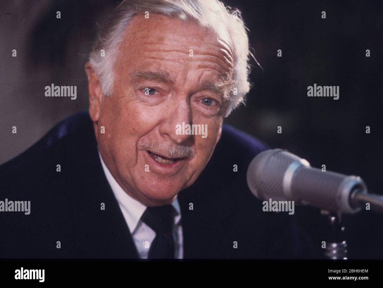 Austin, Texas USA, May 1989: CBS newsman Walter Cronkite speaks at a press conference for the Lower Colorado River Authority after narrating a video on environmental protection for the central Texas agency.  ©Bob Daemmrich Stock Photo