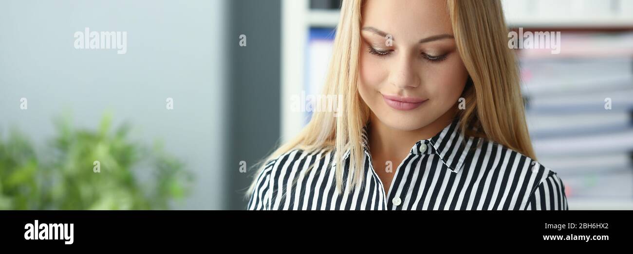 Cute female taking notes Stock Photo