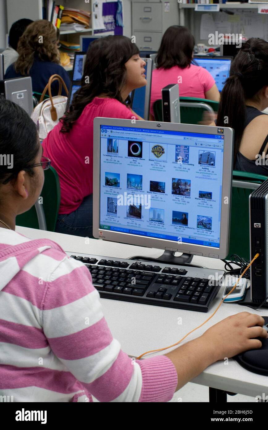 El Paso, Texas  May 28, 2009: High school journalism student using Google images while editing the final edition of the school paper for the 2009 school year at Mission Early College High School in the Socorro district of El Paso. ©Bob Daemmrich Stock Photo