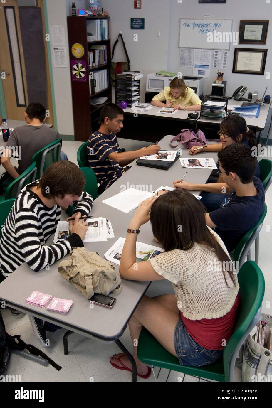 El Paso, Texas  May 28, 2009: Students in journalism class editing the final edition of the school paper for the 2009 school year at Mission Early College High School in the Socorro district of El Paso. ©Bob Daemmrich Stock Photo