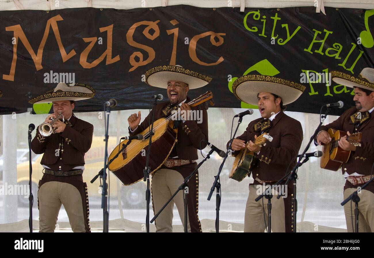 Austin, Texas USA, 2009: Traditional Mexican Mariachi group performs onstage. Instruments include trumpet, guitarron and guitars.  ©Marjorie Kamys Cotera/Daemmrich Photography Stock Photo