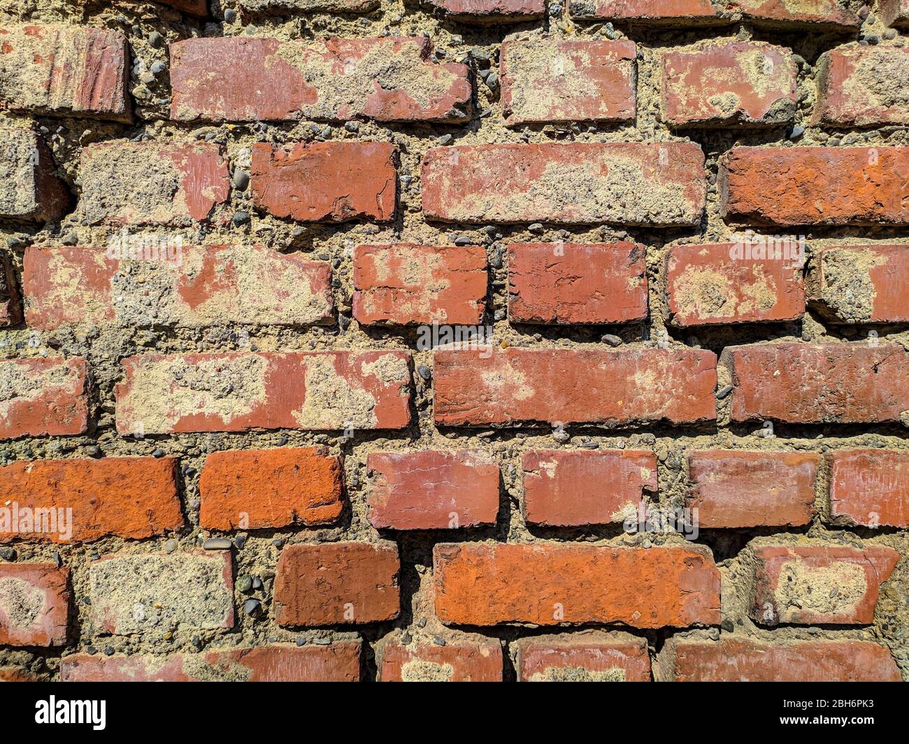 Creepy brick wall of an old warehouse Stock Photo