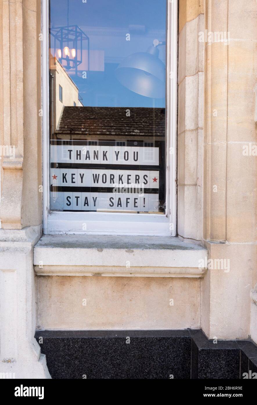 Signs and posters relating to the 2020 Corona virus or Covid-19 with temporary closures of businesses pubs cafes etc in Horsham town UK. Stock Photo