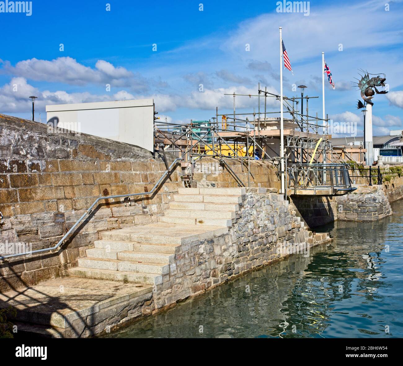The rebuilding of the Mayflower Steps for 'Mayflower 400', Plymouth harbour, Devon, England, UK. Stock Photo