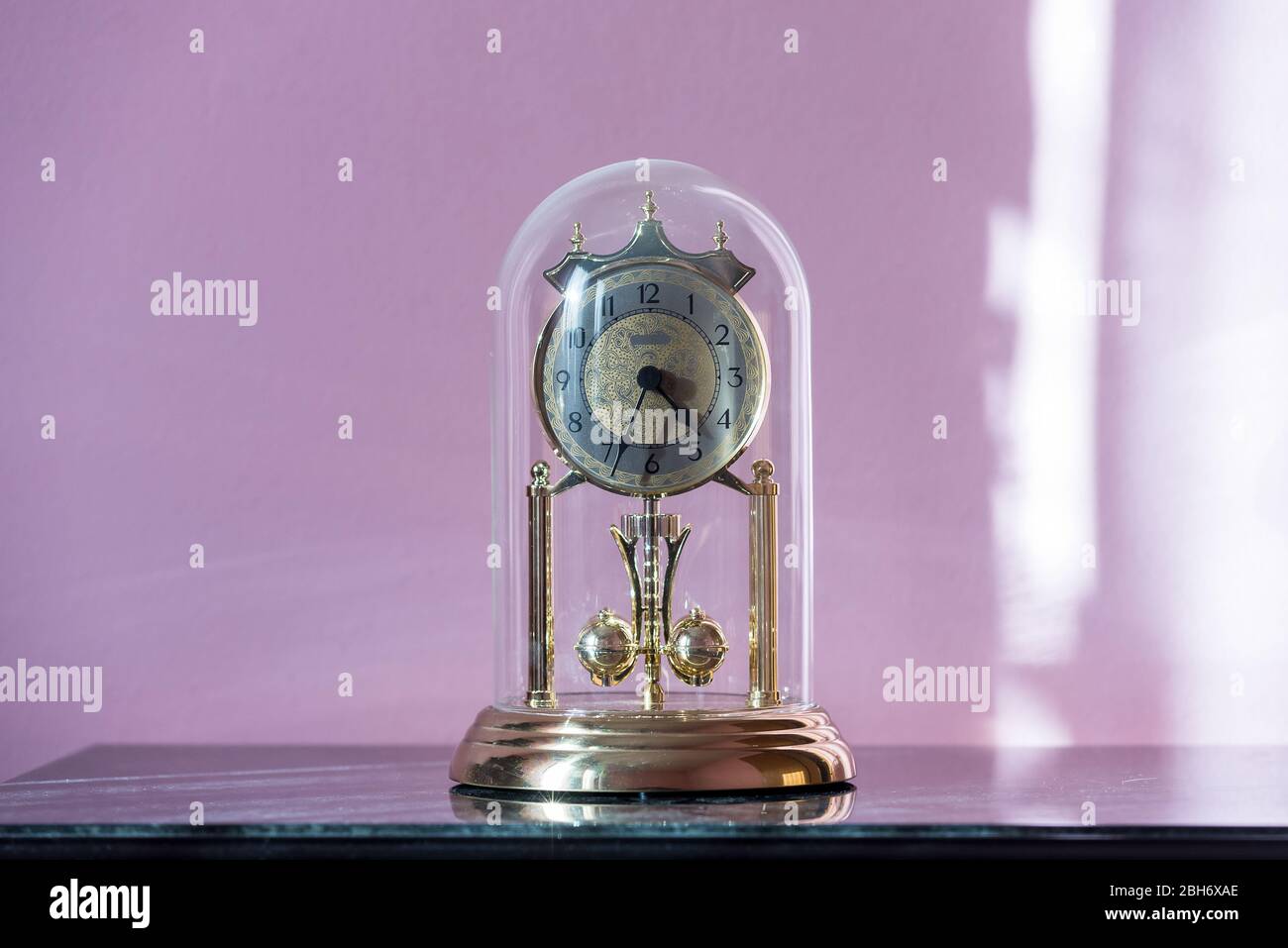 Mantel Clock with Glass Dome & Rotating Pendulum. Period clock with