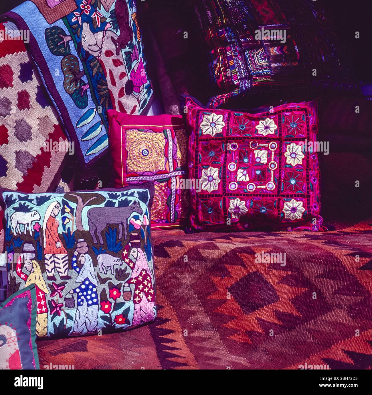 Pakistan, Islamabad, colourful fabrics with local crafts, of carpets