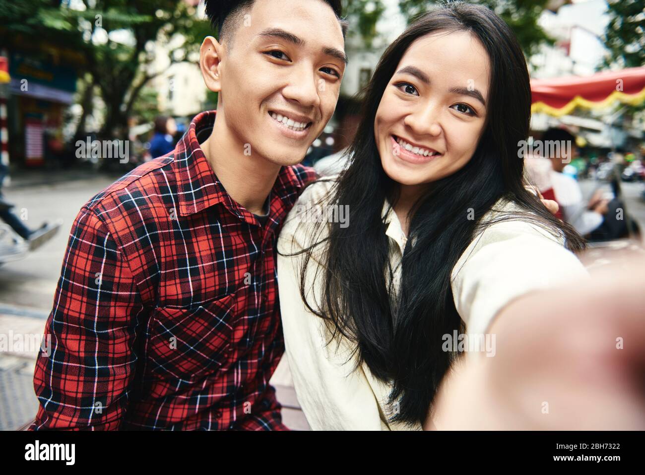 Young couple taking selfie while traveling Stock Photo