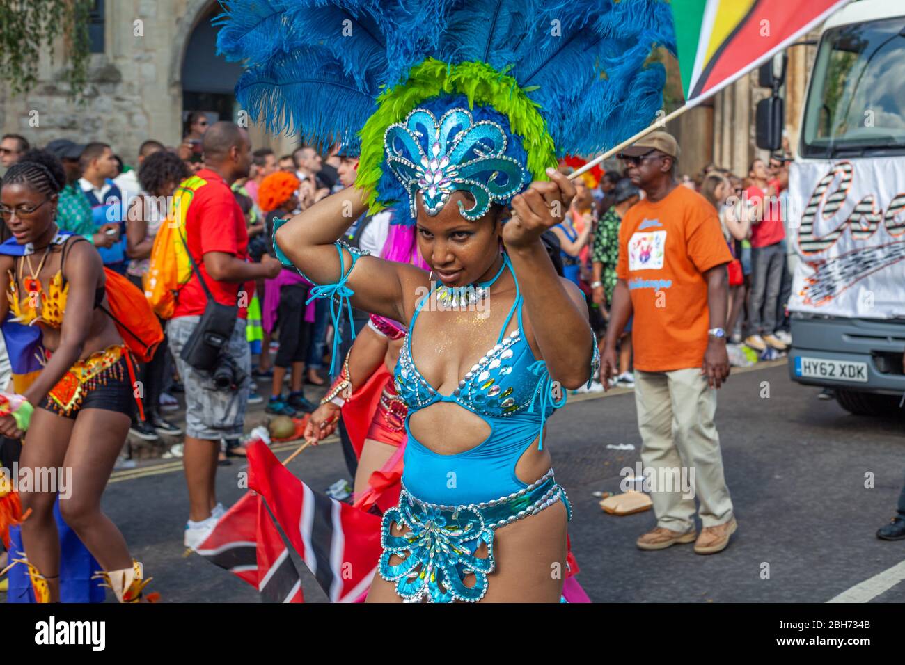 LONDON, UNITED KINGDOM – 26 AUGUST  2013: Carnival performers at sunny day celebrating annual  event in Notting Hill Stock Photo