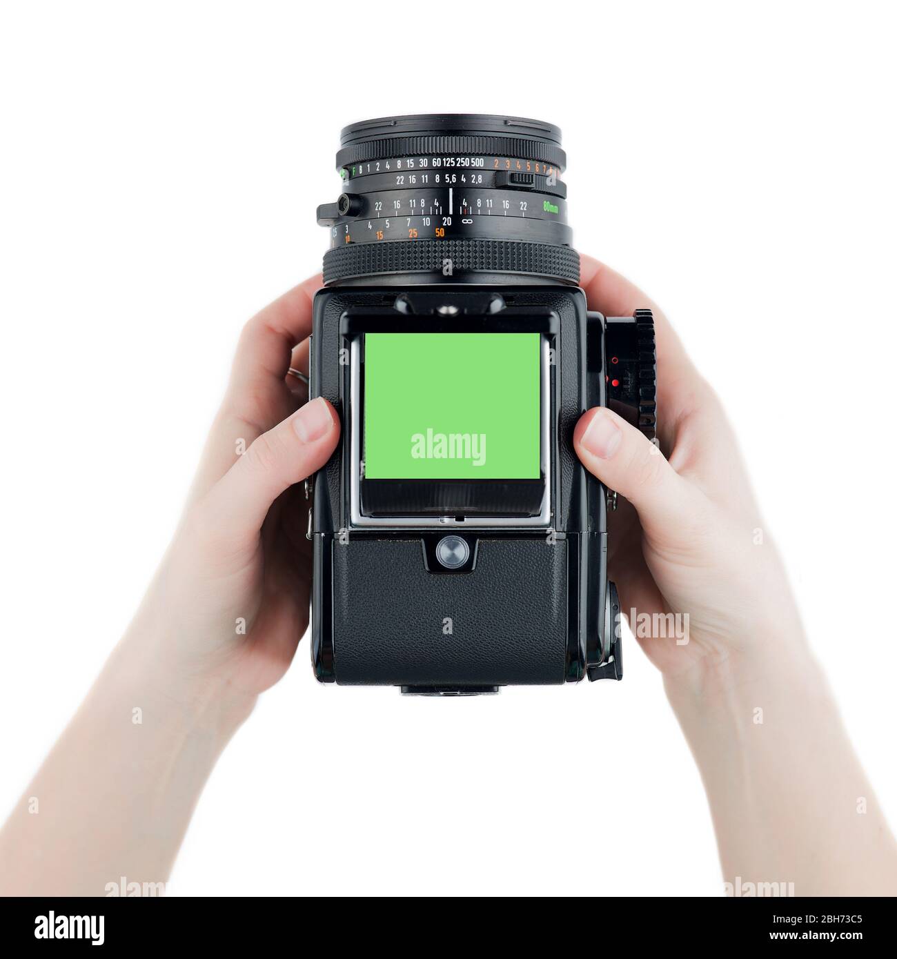 Top view Old school film photo camera in hands medium format isolated on  white background Stock Photo - Alamy