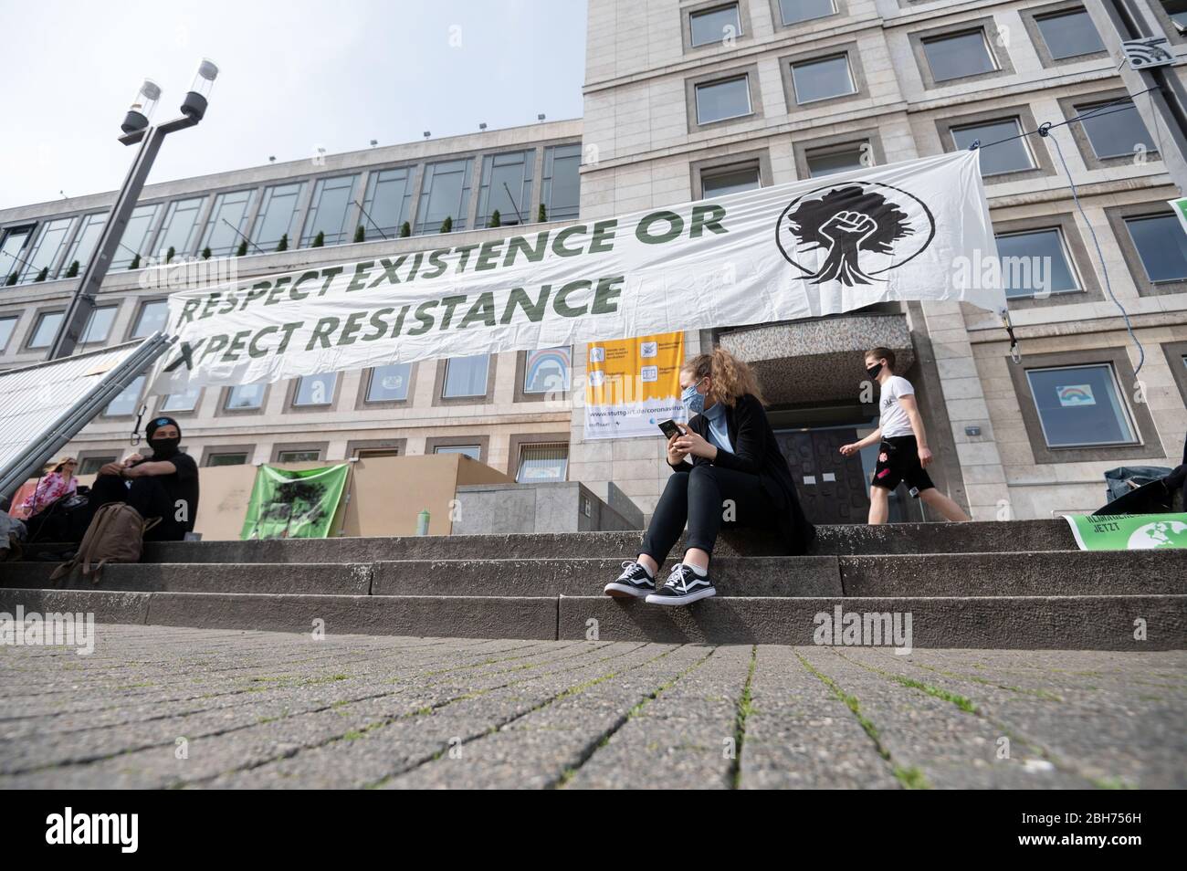 Stuttgart, Germany. 24th Apr, 2020. A banner of the climate movement "Fridays for Future" hangs in front of the town hall during a campaign. Throughout Germany and also in Baden-Württemberg, the organisation called for painted posters to be put up on windows and in the cities, thus continuing the protest while observing contact restrictions. Credit: Marijan Murat/dpa/Alamy Live News Stock Photo