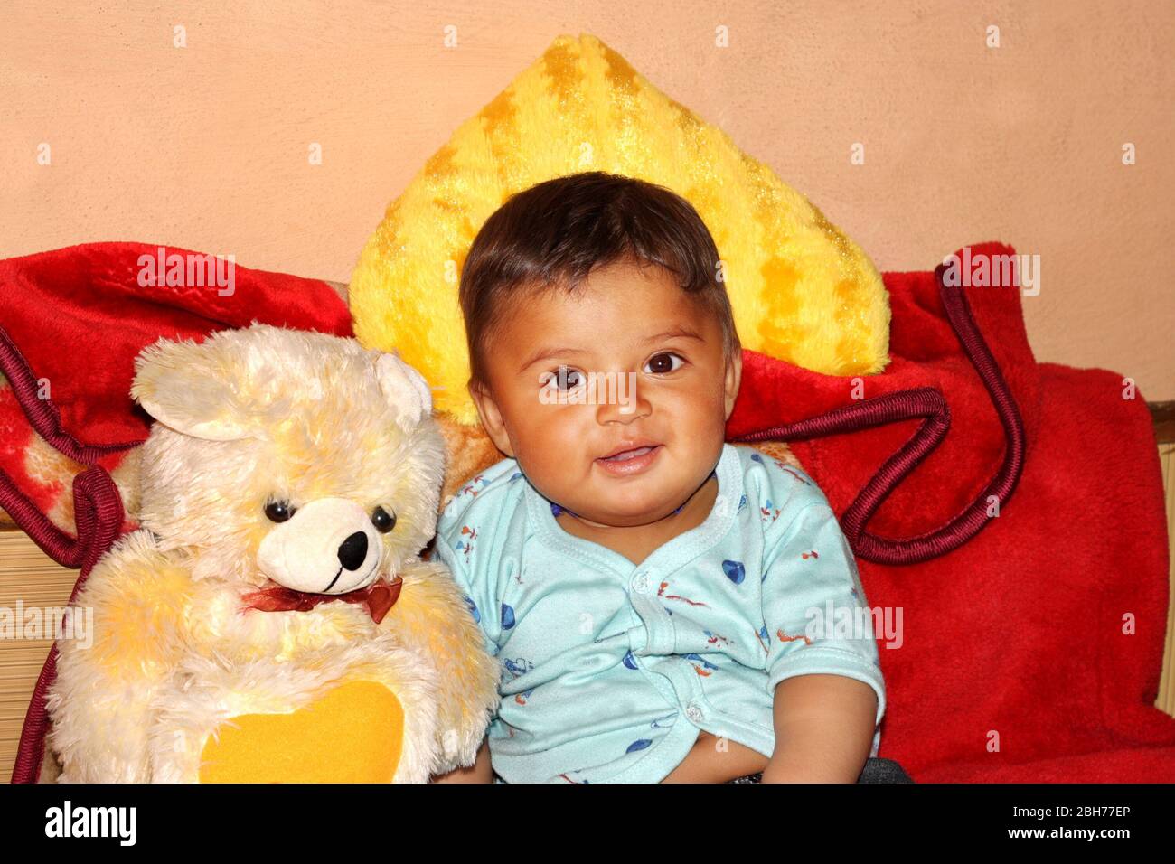1-2 Years boy sitting with teddy bear at home Stock Photo