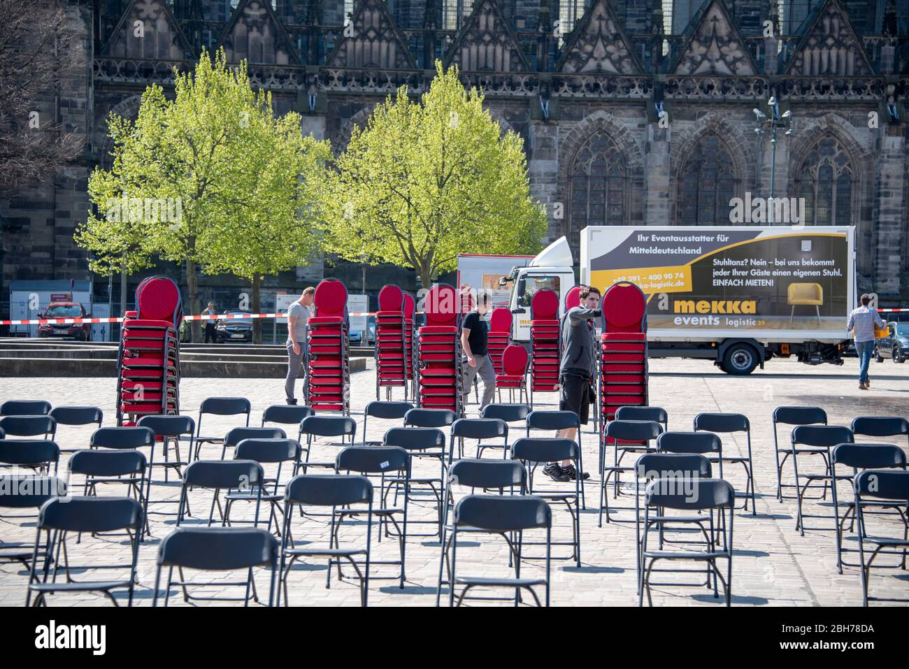 Germany, Magdeburg, April 24, 2020: In Magdeburg, restaurant owners have set up 1000 chairs on the cathedral square. They are protesting against the shutdown. The Corona crisis threatens the death of pubs and restaurants in Germany. Credit: Mattis Kaminer/Alamy Live News Stock Photo