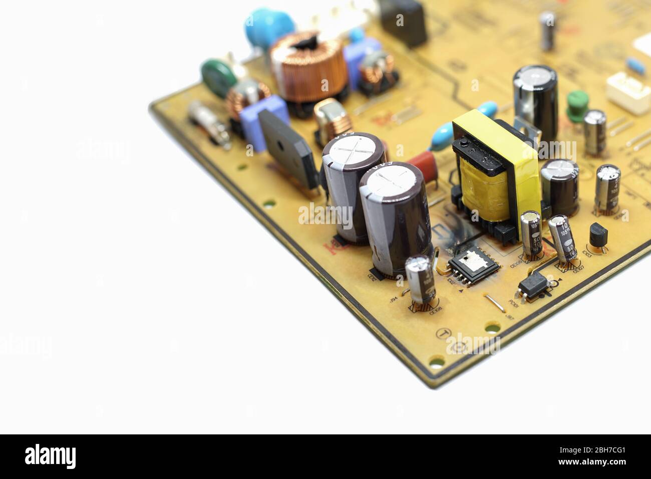 Closed up shot of Broken, damaged integrated circuit on printed circuit board. Stock Photo