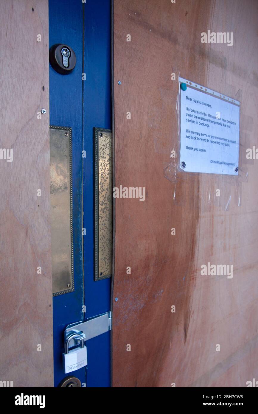 chinese restaurant boarded and locked up during cornonavirus lockdown, Chicheser, West Sussex, England Stock Photo