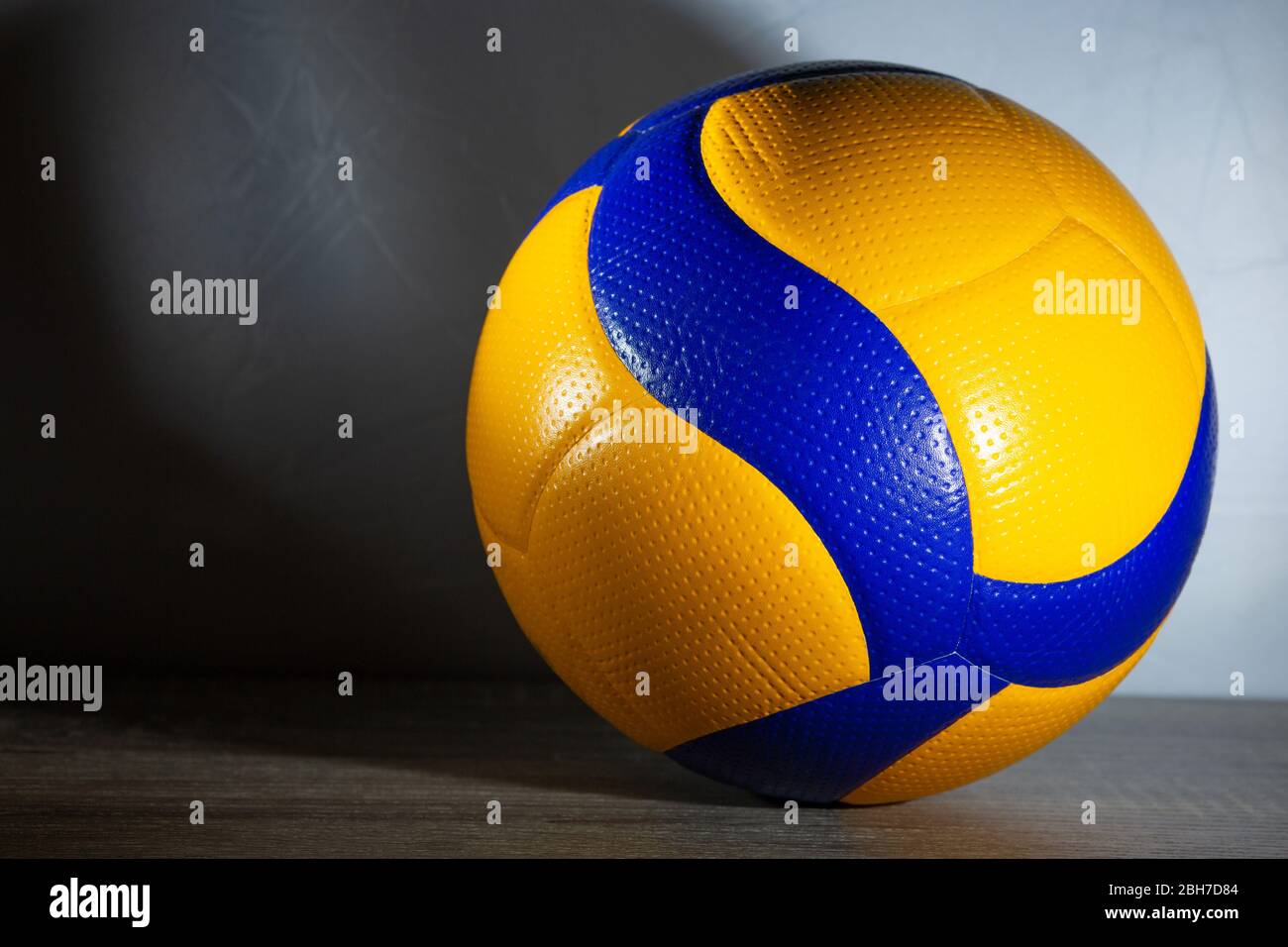 Blue and yellow ball on the grey background Stock Photo