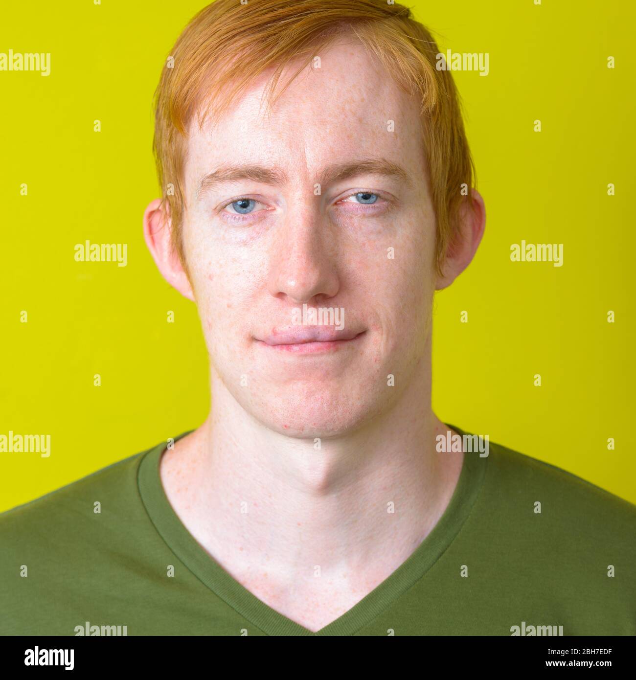 Face of man with red hair looking at camera Stock Photo