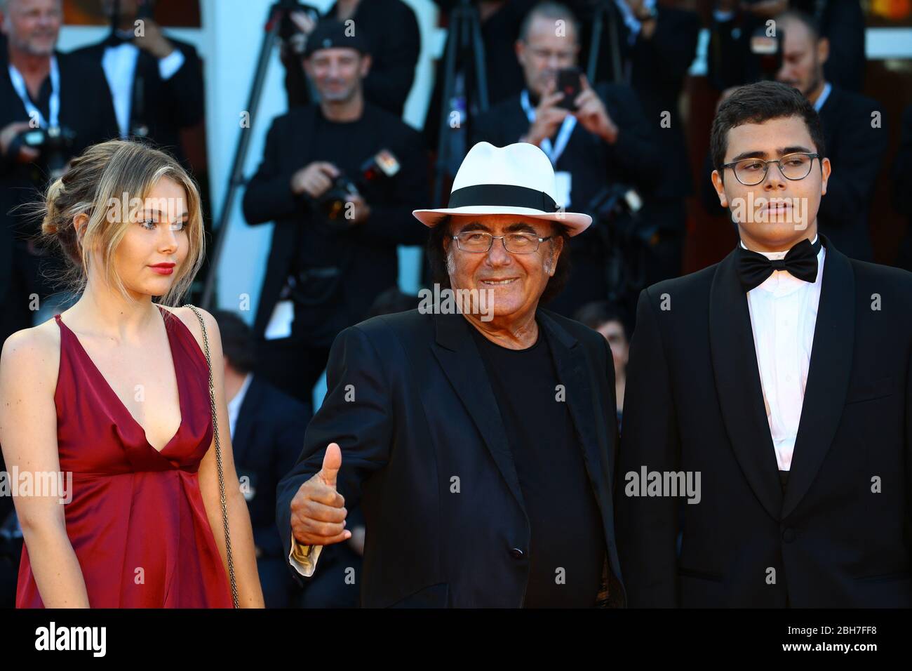 VENICE, ITALY - SEPTEMBER 04:  Al Bano, Jasmine Carrisi and AlBano Carrisi Jr walks the red carpet of the 'Vox Lux' screening Stock Photo
