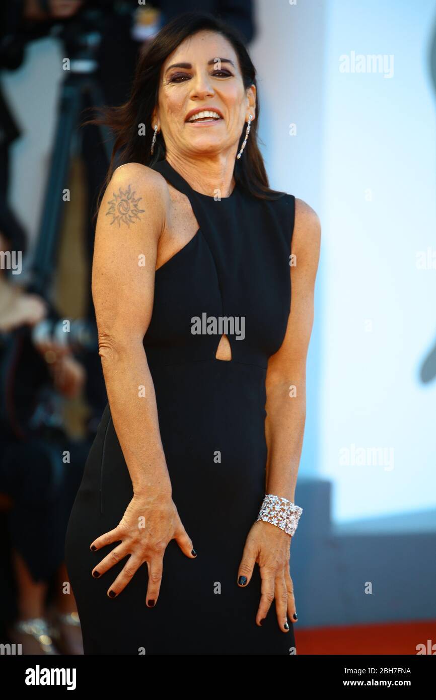 VENICE, ITALY - SEPTEMBER 04: Paola Turci walks the red carpet of the