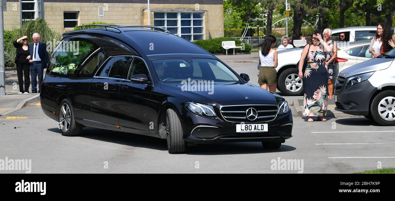 Syd little and his wife sheree left watch as the hearse containing